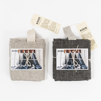 KOOS_present_beige_black.jpg (200×200)